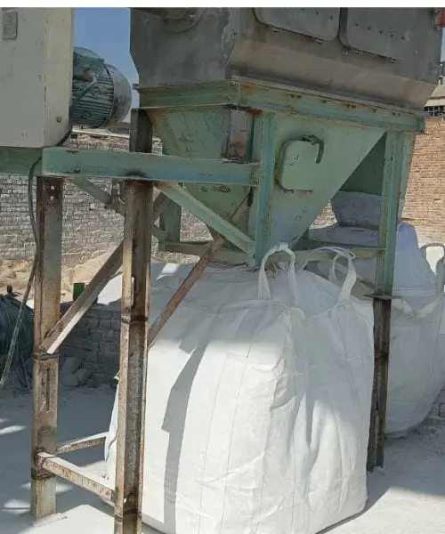 A hopper structure filling a white bulk bag